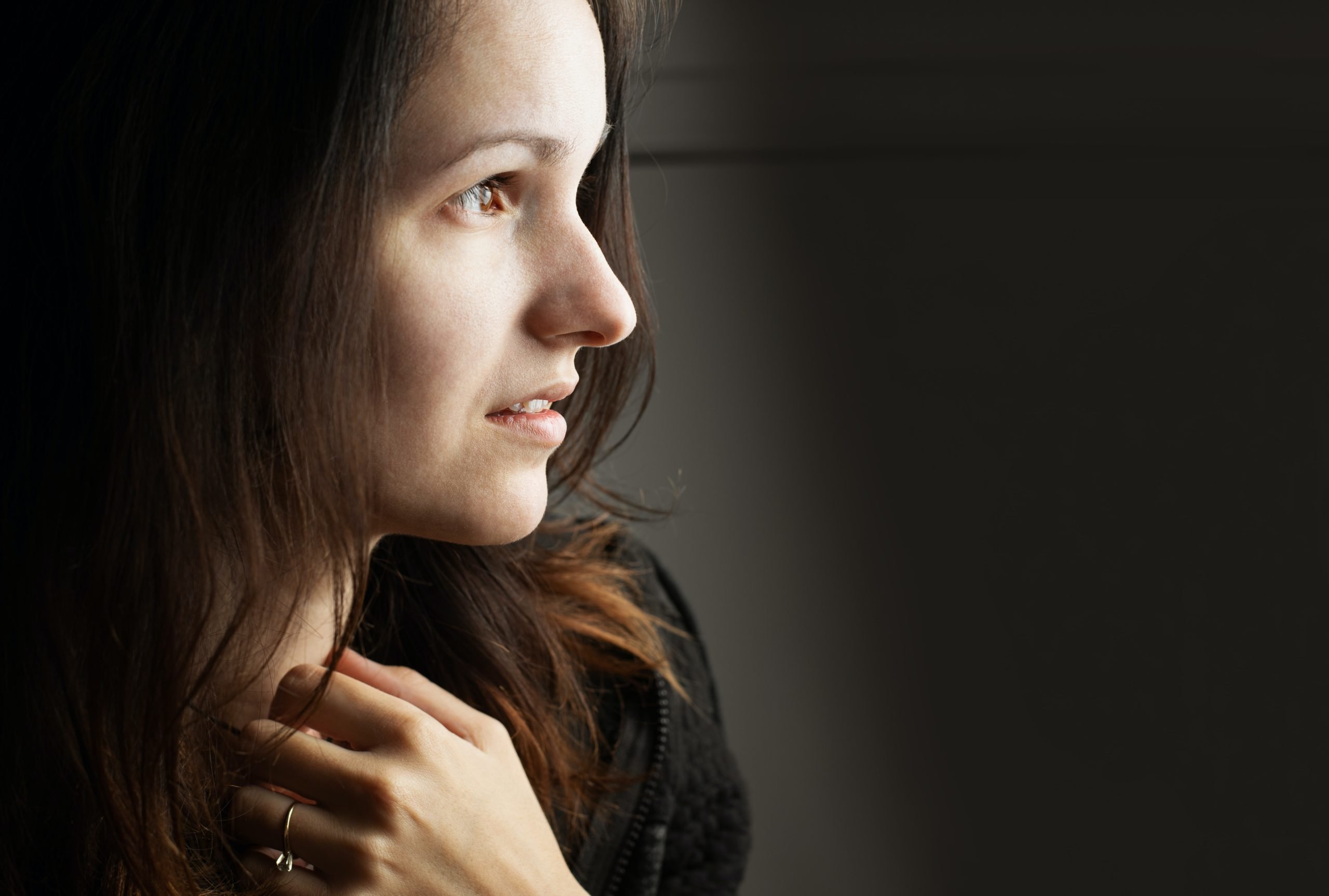 woman in dark lighting