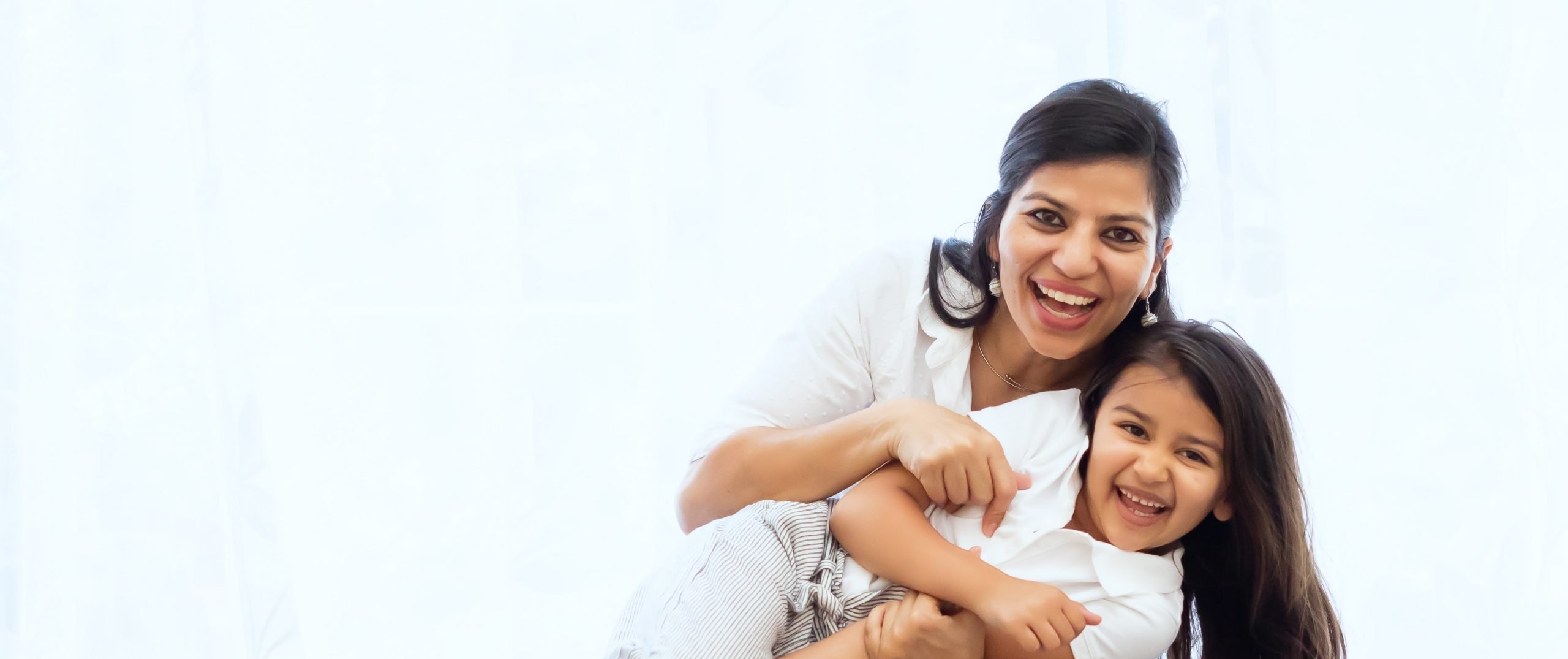 mother and child looking happy